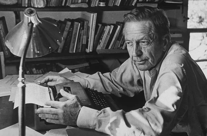 American author John Cheever (1912 - 1982) sits at his desk in front of a typewriter at his home in Ossining, New York, 6th October 1979. (Photo by Paul Hosefros/Archive Photos/Getty Images)