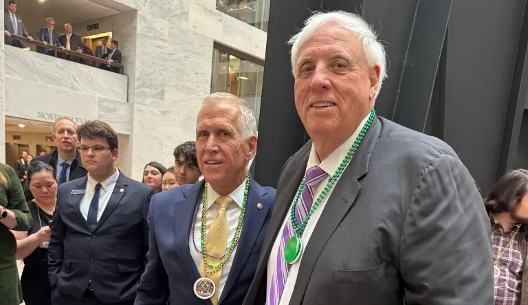 Sen. Jim Justice (R-WV) stands with Sen. Thom Tillis (R-NC), who hosted the final dog parade of his Senate career on Wednesday on Capitol Hill. (David Sivak/Washington Examiner)