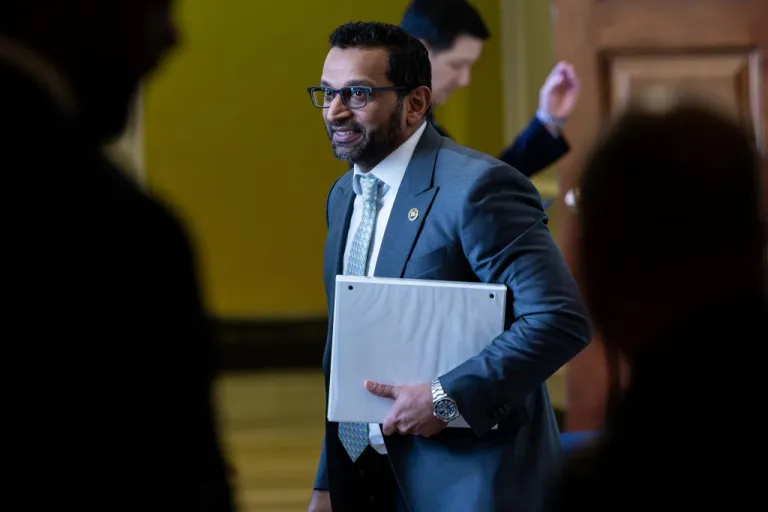 FBI Director Kash Patel leaves a closed door meeting.