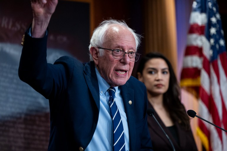 Sen. Bernie Sanders (I-VT) speaks alongside Rep. Alexandria Ocasio-Cortez (D-NY) at a press conference.