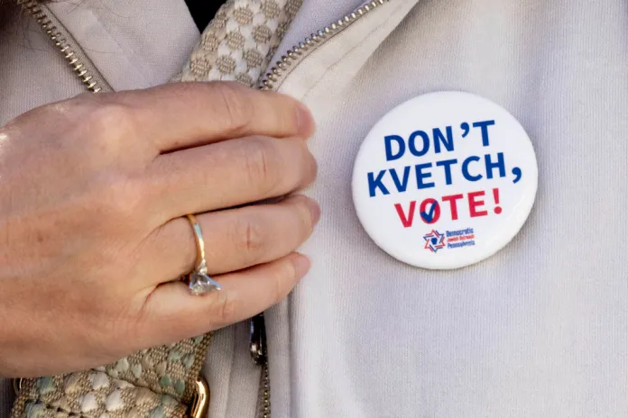 A button targeting Jewish voters during the Jewish holiday of Sukkot in Bala Cynwyd, Pa on Sunday, Oct. 20, 2024.  (AP Photo/Laurence Kesterson)