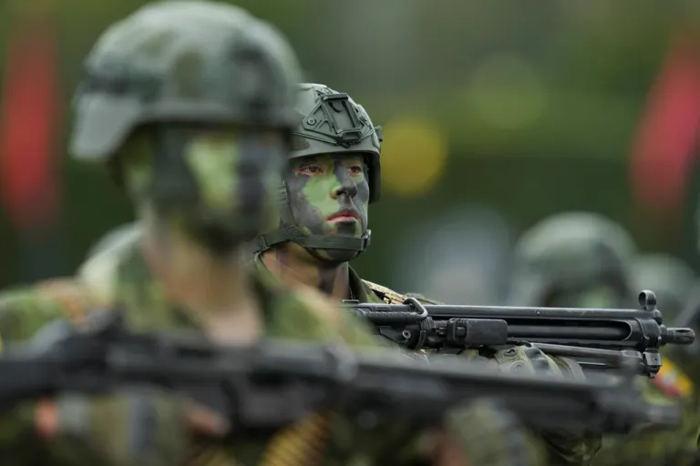 Soldiers take part in a military ceremony marking Army Day, in Quito, Ecuador, Thursday, Feb. 27, 2025.