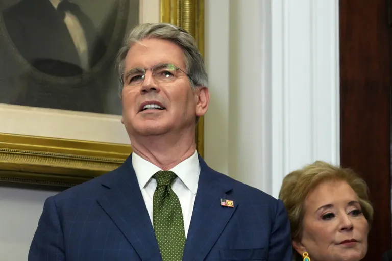 Treasury Secretary Scott Bessent, left, and Secretary of Education Linda McMahon