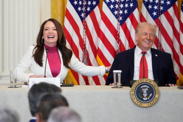 Agriculture Secretary Brooke Rollins laughs with President Donald Trump.
