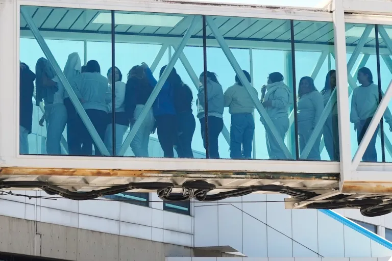 Venezuelans deported from the United States deplane at Simon Bolivar International Airport in Maiquetia, Venezuela, Monday, Jan. 19, 2026. (AP Photo/Matias Delacroix)