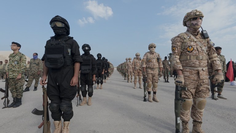 troops standing at attention during the guard's drill in the Persian Gulf.