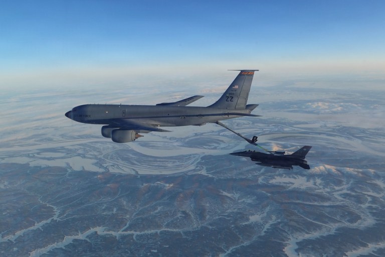 A North American Aerospace Defense Command F-16 fighter refueling from a KC-135 Stratotanker.