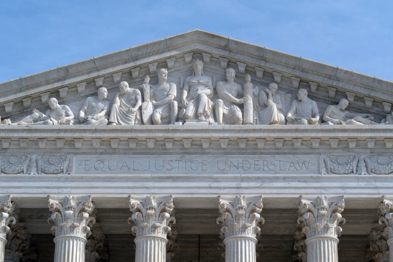 The U.S. Supreme Court is seen Friday, Feb. 20, 2026, in Washington. The Supreme Court struck down President Donald Trump's far-reaching global tariffs on Friday, handing him a stinging loss that sparked a furious attack on the court he helped shape. (AP Photo/Jose Luis Magana)