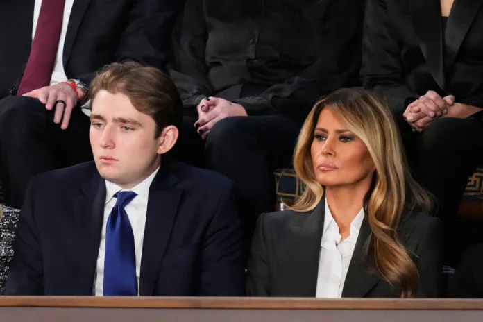 Barron Trump sits next to his mother, Melania Trump, at the State of the Union.