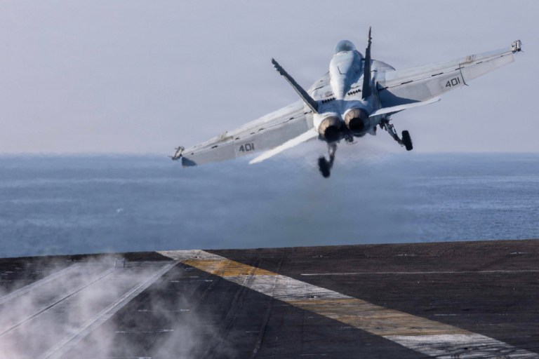 This image provided by U.S. Central Command shows a F/A-18E Super Hornet launching from the flight deck of Nimitz-class aircraft carrier USS Abraham Lincoln (CVN 72) in support of Operation Epic Fury, on Saturday, Feb. 28, 2026.