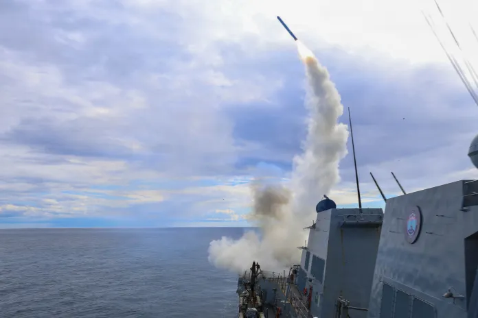 The Arleigh Burke-class guided-missile destroyer USS Thomas Hudner firing a Tomahawk Land Attack Missile.