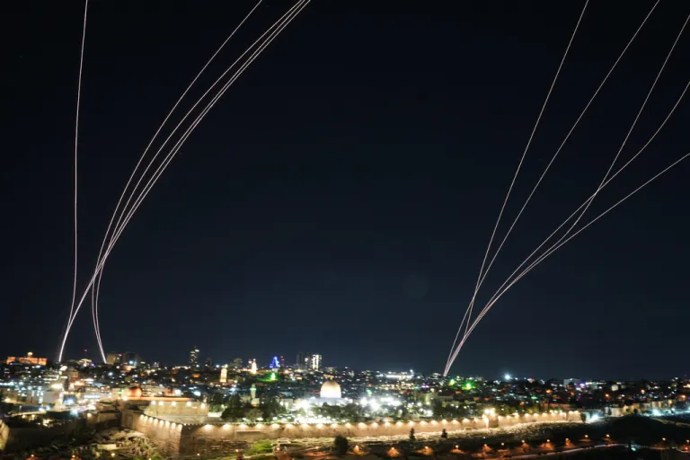 Israeli air defense system fires to intercept missiles launched from Iran toward Israel, over Jerusalem, Sunday, March 1, 2026. (AP Photo/Mahmoud Illean)