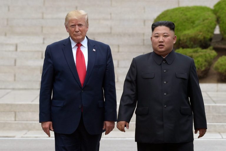 President Donald Trump, left, meets with North Korean leader Kim Jong Un
