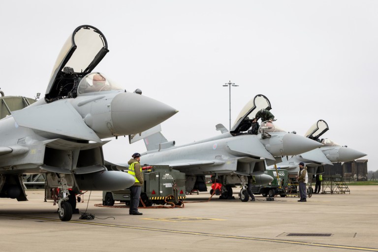 RAF Typhoon aircraft are prepared to depart RAF Coningsby.