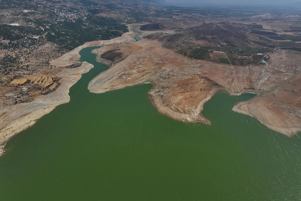 FILE - This photo shows low water levels at Lake Qaraoun, one of the Lebanon's largest reservoirs, in Qaraoun village, eastern Lebanon, Aug. 6, 2025. 