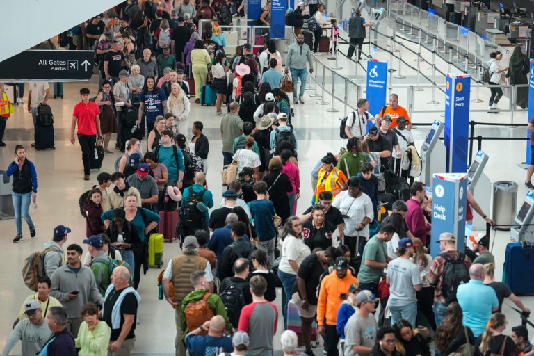 Airline passengers wait in long lines to get through the TSA security screening at William P. Hobby Airport in Houston.