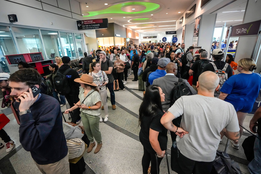 Storms and DHS shutdown snarl flights as airports see delays and staff shortages