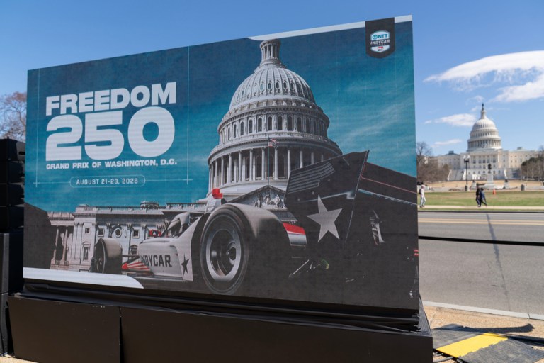 A billboard announcing a IndyCar street race circuit 