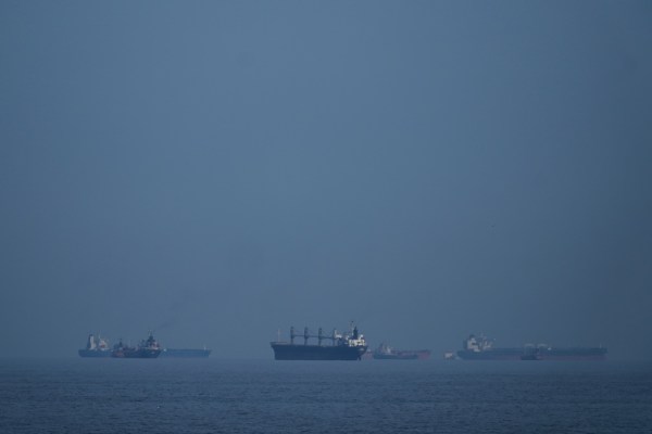 Three cargo ships damaged by projectiles in Strait of Hormuz