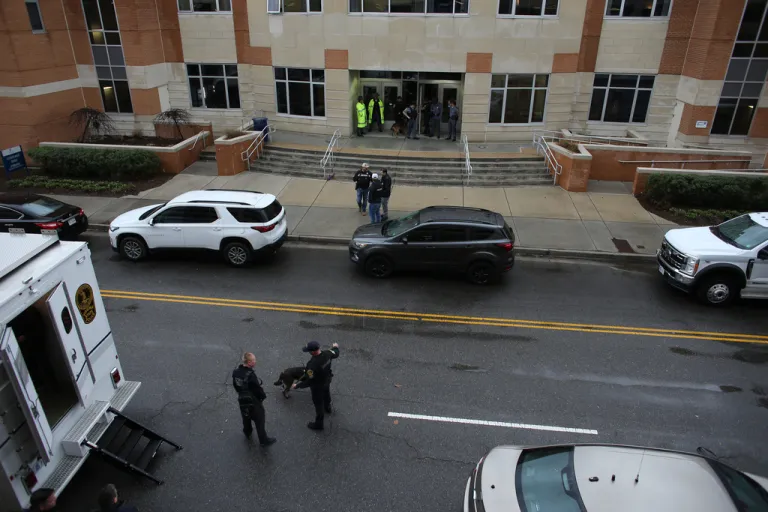 Police vehicles on Old Dominion University building