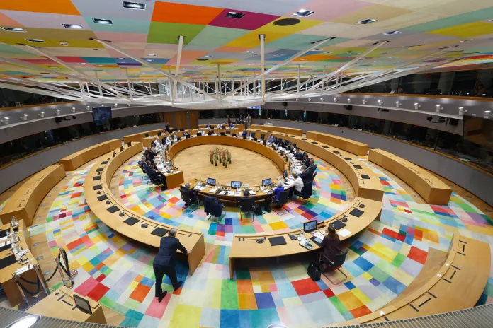 European leaders gather around a circular table for the European Summit