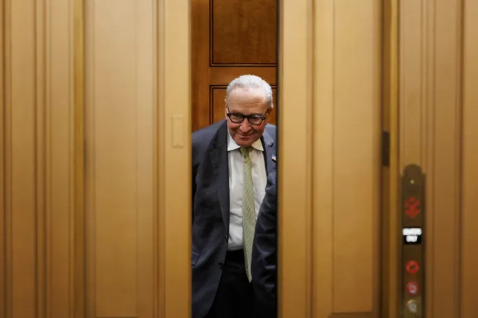 Senate Minority Leader Chuck Schumer, D-N.Y., enters an elevator at the U.S. Capitol, Friday, March 20, 2026, in Washington