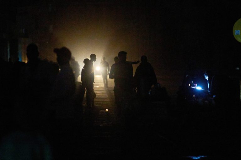 People walk on a street in the dark during a blackout in Havana, Cuba, Saturday, March 21, 2026. There have been three since the U.S. has blocked oil shipments to the island.