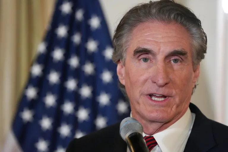 Doug Burgum talking into a mic