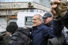 Top Iranian officials stroll Tehran streets at rally before midday explosion