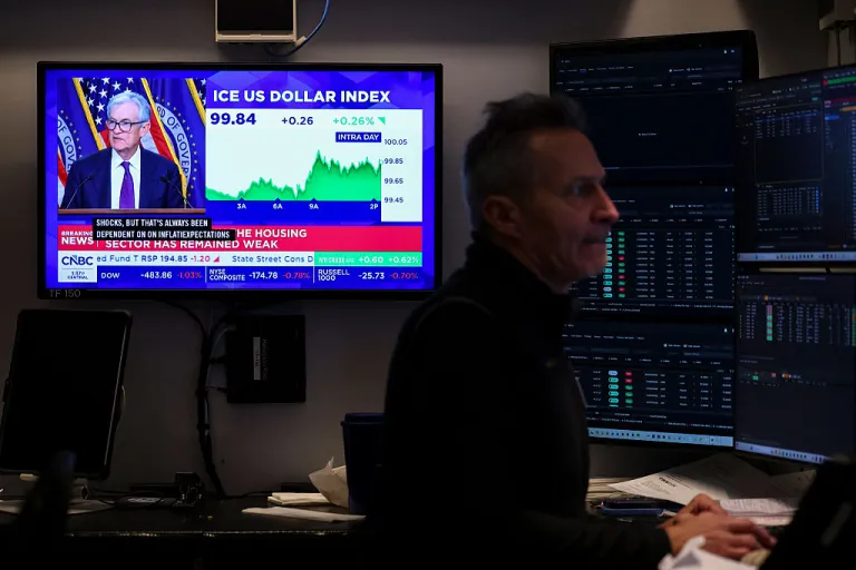 A livestream shows Jerome Powell, chairman of the US Federal Reserve, speaking after a Federal Open Market Committee (FOMC) meeting on the floor of the New York Stock Exchange (NYSE) in New York on March 18, 2026. The US Federal Reserve kept interest rates unchanged Wednesday as expected, in defiance of President Donald Trump as the world's largest economy battles stubborn inflation, weak labor demand and an 