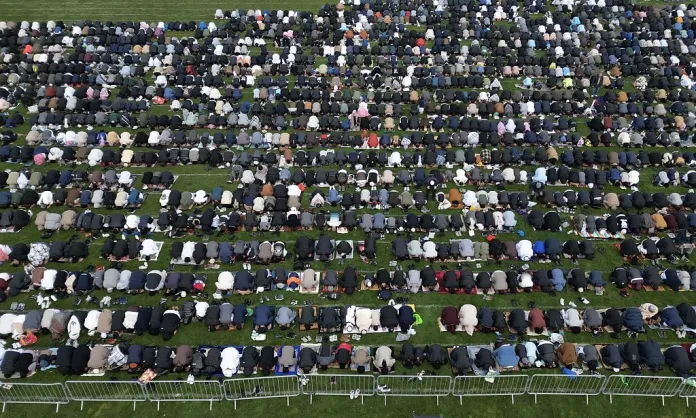 BIRMINGHAM, UNITED KINGDOM - MARCH 20: Worshippers take part in the Eid al-Fitr morning prayer to mark the first day of Eid in Small Heath Park on March 20, 2026 in Birmingham, United Kingdom. (Photo by Giannis Alexopoulos/Anadolu via Getty Images)