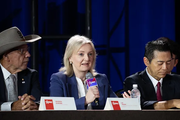 Former UK Prime Minister Liz Truss speaks at a conference during the Conservative Political Action Conference at the Gaylord Texan Resort & Convention Center, in Grapevine, Texas, on March 25, 2026. American conservatives converge on Texas this week for what organizers bill as their largest and most influential gathering, with the Iran war and fears of a punishing midterm election cycle heightening the stakes.