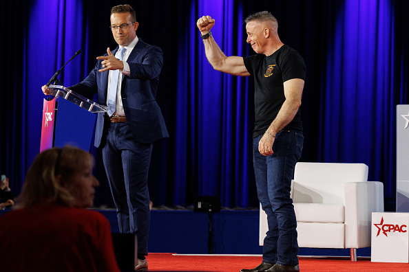 Former Border Patrol Chief Gregory Bovino, right, is introduced during the Conservative Political Action Conference (CPAC) in Grapevine, Texas, US, on Thursday, March 26, 2026. The Conservative Political Action Conference launched in 1974 brings together conservative organizations, elected leaders, and activists. 