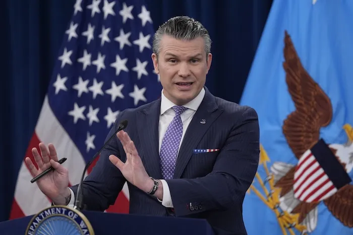 Defense Secretary Pete Hegseth speaks to members of the media during a press briefing at the Pentagon in Washington, Tuesday, March 31, 2026.