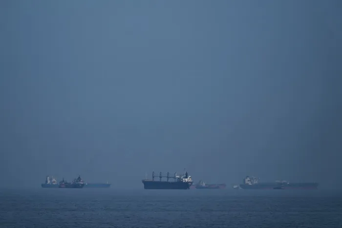 Oil tankers and cargo ships line up in the Strait of Hormuz.