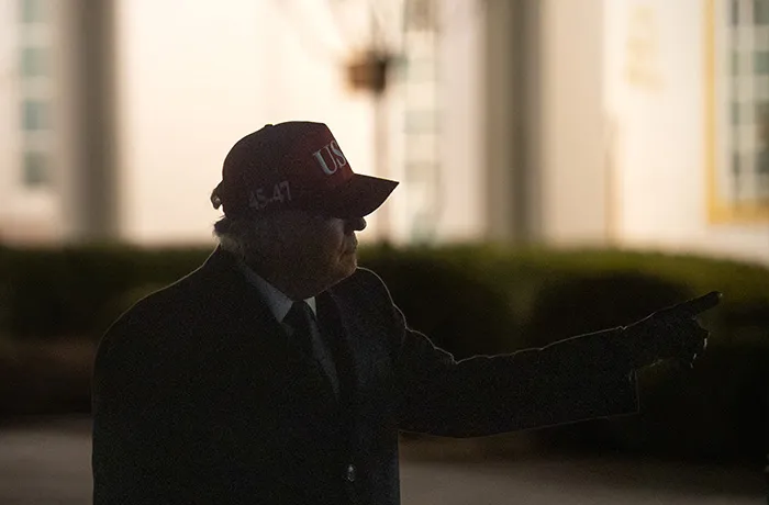 President Donald Trump examines a new statue of Thomas Jefferson in the Rose Garden after returning to the White House on March 1. Trump ordered strikes against Iran while spending the weekend at his Mar-a-Lago resort in Florida. (Peter W. Stevenson/The Washington Post via Getty Images)