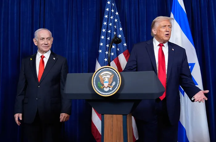 President Donald Trump answers a question from a reporter at the end of a news conference with Israeli Prime Minister Benjamin Netanyahu at Mar-a-Lago in Florida on Dec. 29, 2025. (Alex Brandon/AP)
