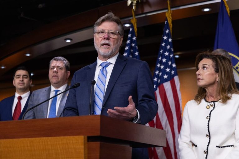 House Intelligence Committee Chairman Rick Crawford (R-AR) speaks at a news conference.