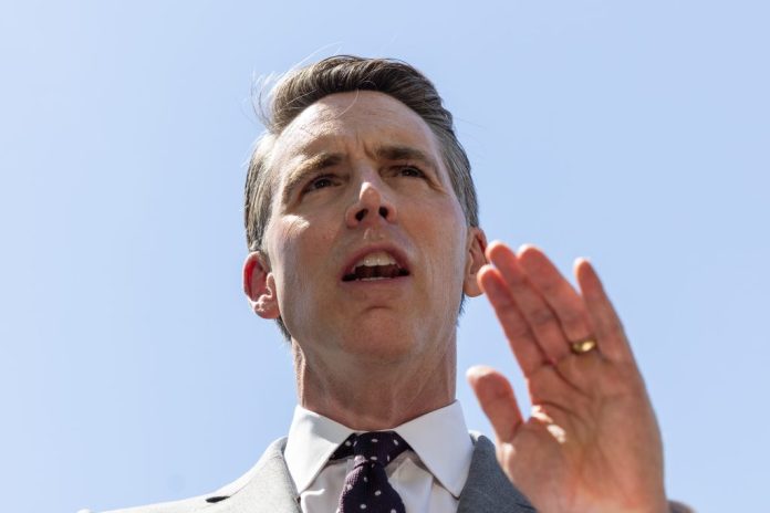 Sen. Josh Hawley (R-MO) speaks at a press conference.