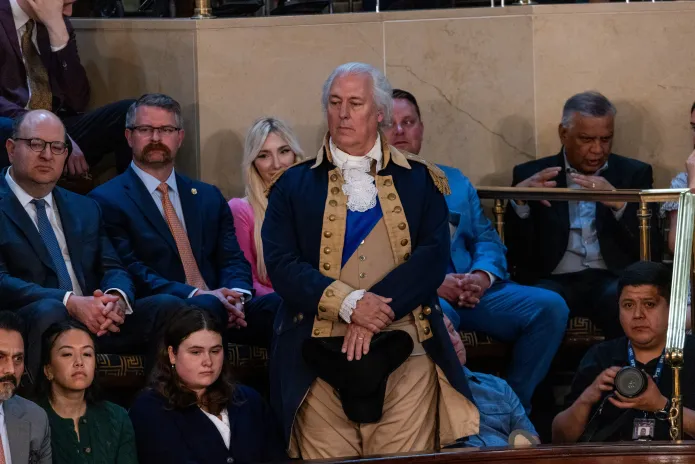 A man dressed as George Washington attended King Charles III's speech to congress on Tuesday, April 28