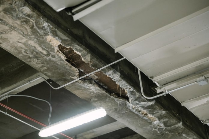 Hundreds of points of water intrusion were identified in the parking garage, causing rust and deterioration.