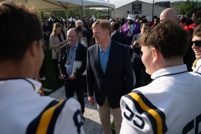 Commissioner of the NFL Roger Goodell talks high school football players at the U.S. Steel Community Field at Hazelwood Green after it’s ribbon cutting on Wednesday, April 22, 2026.