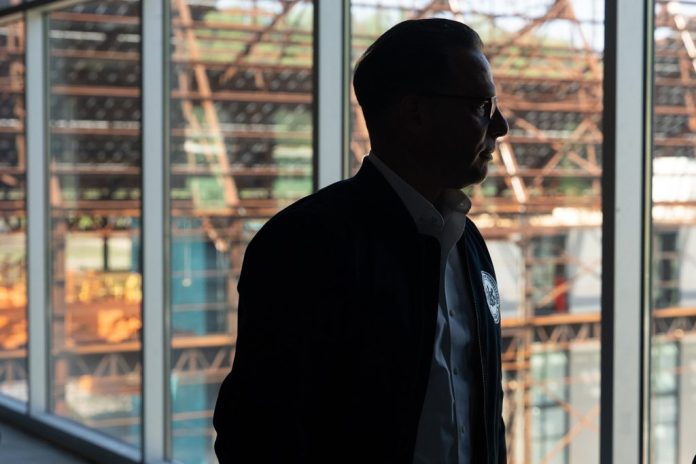 Pennsylvania Governor Josh Shapiro stands overlooking Mill 19, at the former site of the original Hazelwood Works, once the largest steel mill in the U.S., on Wednesday, April 22, 2026. Governor Shapiro joined others at the Powering the Future of Sport: A Draft Week Showcase at CMU’s Robotics Innovation Center at Hazelwood Green.