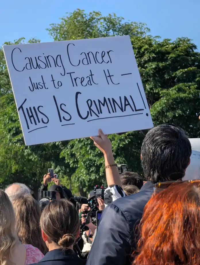 Protestor holding sign in front of the Supreme Court on April 27, 2026. (Gabrielle Etzel, Washington Examiner)