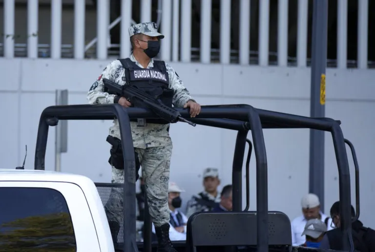 Security personnel guard the prosecutor's building where Ovidio Guzman, one of the sons of former Sinaloa Cartel boss Joaquin 