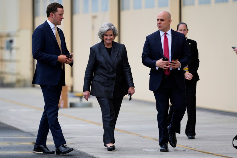 White House chief of staff Susie Wiles walks with White House deputy chief of staff James Blair.