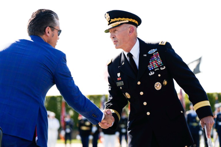 Defense Secretary Pete Hegseth, left, and Army Chief of Staff Gen. Randy George shake hands