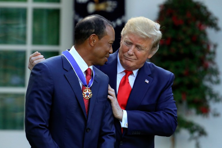 President Donald Trump presents the Presidential Medal of Freedom to Tiger Woods