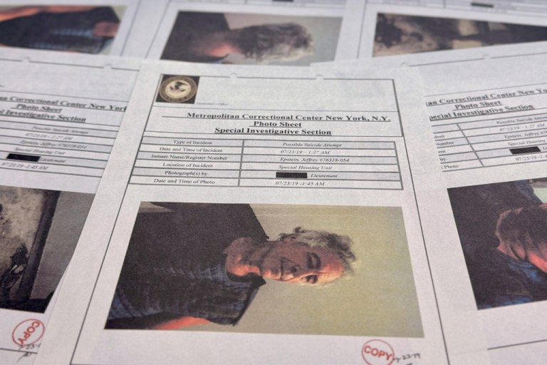 Documents that were included in the U.S. Department of Justice release of the Jeffrey Epstein files are photographed Friday, Jan. 2, 2026. (AP Photo/Jon Elswick)