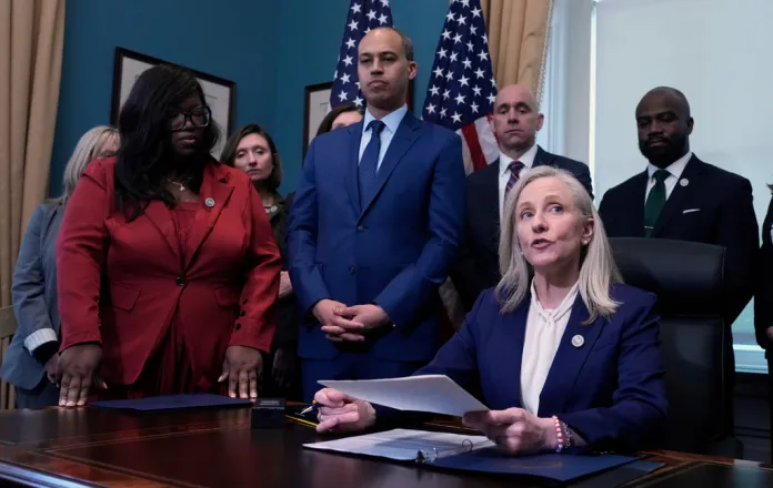 Virginia Gov. Abigail Spanberger signs executive orders.